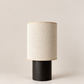 Lampe à poser SIMONE / Petit format en Bois de frêne teinté noir et raphia naturel
